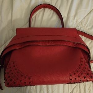 Authentic Tod's fuchsia Pink Wave leather handbag